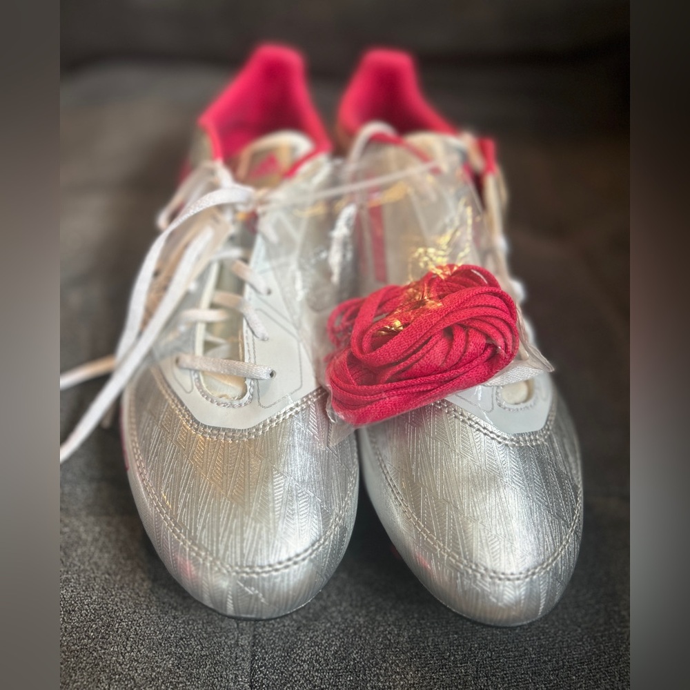 Adidas F10 TRX FG W women's soccer cleats in the silver and pink colorway